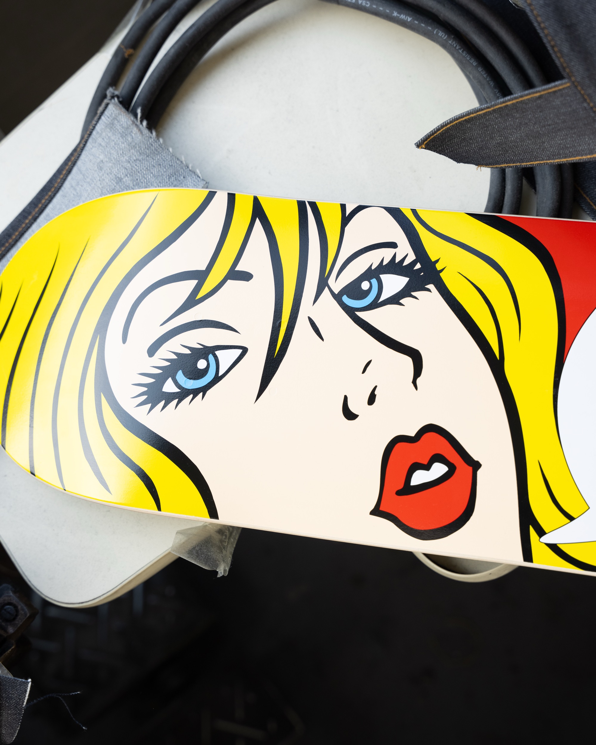 Naked & Famous Denim skateboard deck artwork